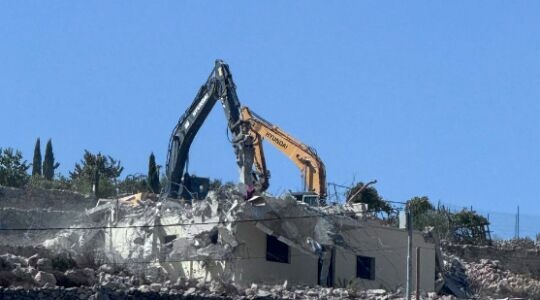 Zionist occupation forces compel Palestinian to self-demolish her house in Jabal Al-Mukabbir   